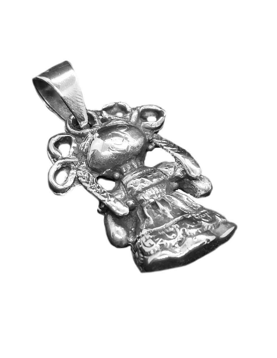 Dije de muñeco de plata 2